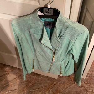 Turquoise leather jacket.